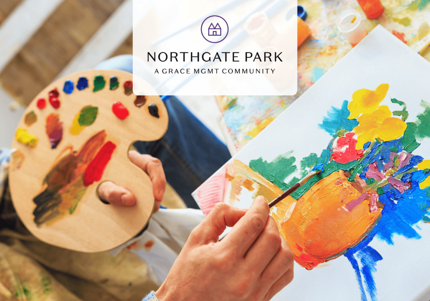 Person painting a bright abstract artwork while holding a paintbrush and palette, with a translucent Northgate Park logo overlay